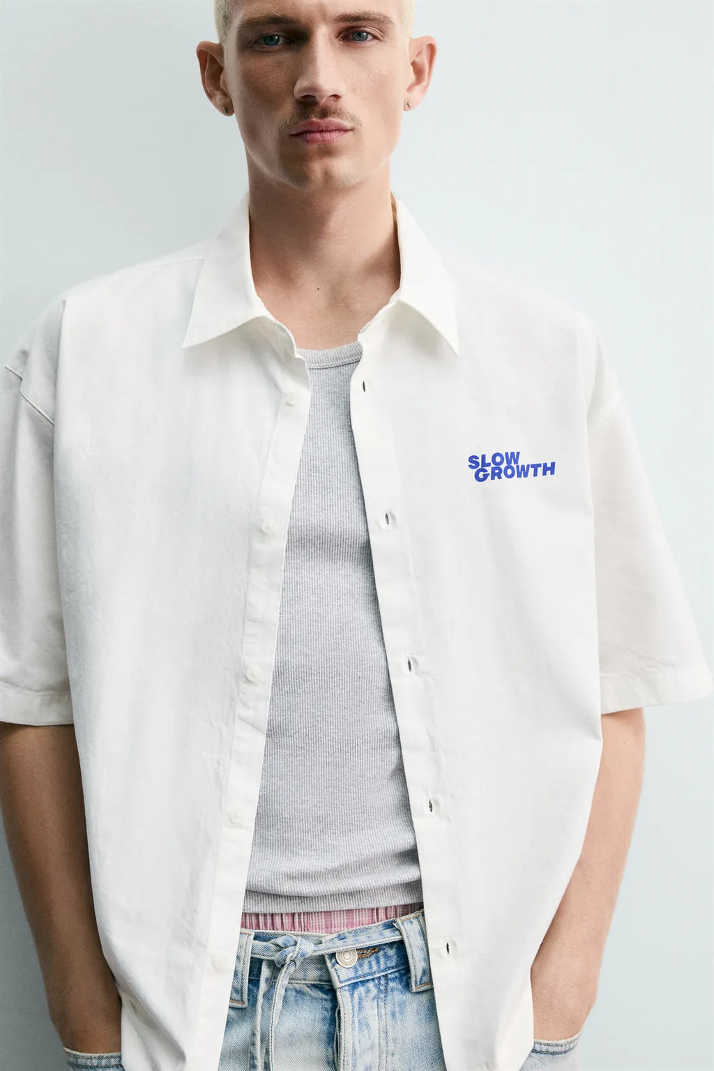 WASHED SHIRT WITH GRAPHIC PRINTS